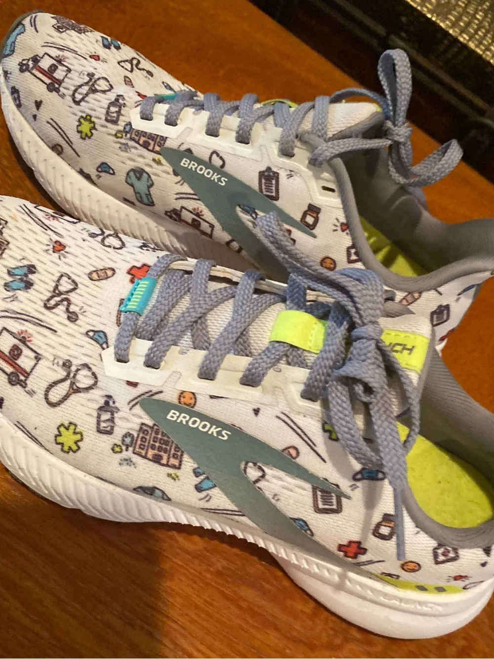 Brooks Kids White Sneakers with Light Gray Logos and Blue Accents
